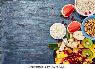 Fruits And Berries For Fruit Salad. Oatmeal, Nuts. Healthy Breakfast Concert, Top View. Copy Space