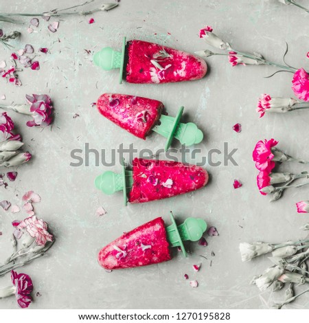 Similar – Image, Stock Photo Red fruit ice cream on a stick