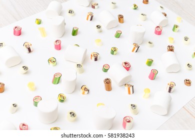 Fruits lollipops, happy new year. Candy, top view flat lay, handmade pattern on white background. Sweet sucker, lollipop, candy, isolated minimal concept above decoration, food background