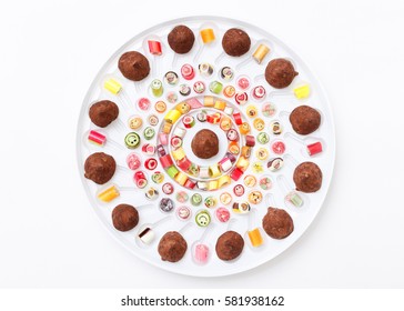 Fruits lollipops, heart and smile. Candy, top view flat lay, handmade pattern on white background. Sweet sucker, lollipop, candy, minimal concept above decoration. Chocolate Candy, Truffle