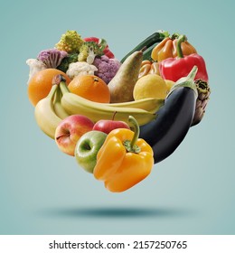 Fruits and vegetables arranged in a heart shape, healthy food and nutrition concept, isolated - Powered by Shutterstock