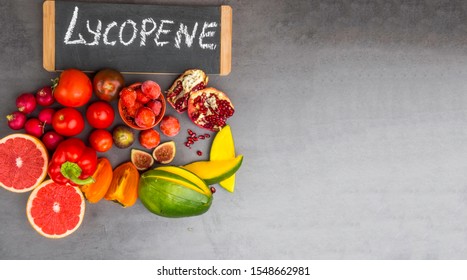 Fruits And Vegetables Containing Lycopene. Healthy Vegan Food Background. Lycopene Is A Red Carotenoid Pigment