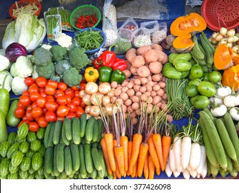 Fruits and vegetables at a Farmers Market - Shutterstock ID 377426098