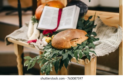 Fruits and vegetables for harvest in the church with Bible