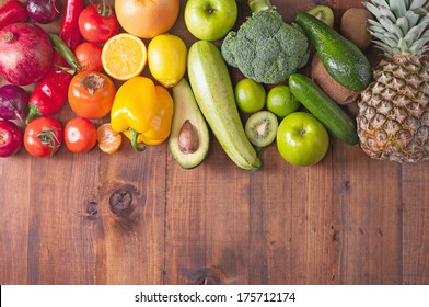 Fruits And Vegetables On Background Wooden Table