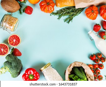 Fruits And Vegetables On A Blue Background, Flatlay, Top View. The Concept Of Healthy Eating. Fresh Organic Fruits And Vegetables Are Framed On A Blue Background.