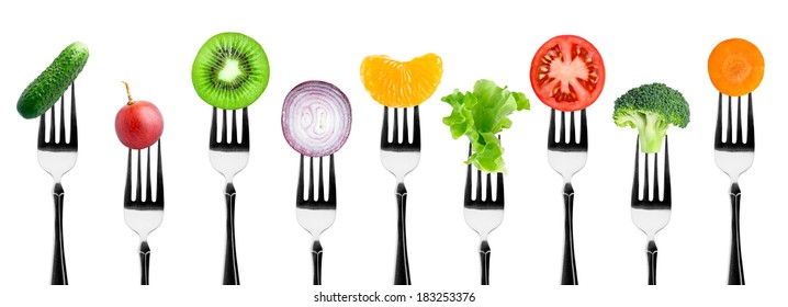 Fruits And Vegetables On The Forks. Healthy Food