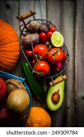 Fruits and vegetables on wooden background