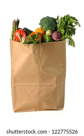 Fruits And Vegetables In Paper Grocery Bag Isolated Over White Background