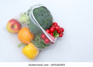 Fruits And Vegetables In A Reusable Eco Friendly Net Bag. Eco Concept.