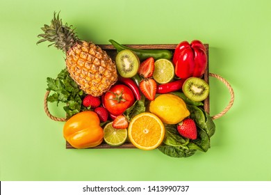 Fruits and vegetables rich in vitamin C in box. Healthy eating. Top view