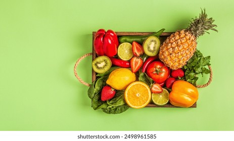 Fruits and vegetables rich in vitamin C in box. Healthy eating. Top view - Powered by Shutterstock