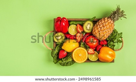 Fruits and vegetables rich in vitamin C in box. Healthy eating. Top view