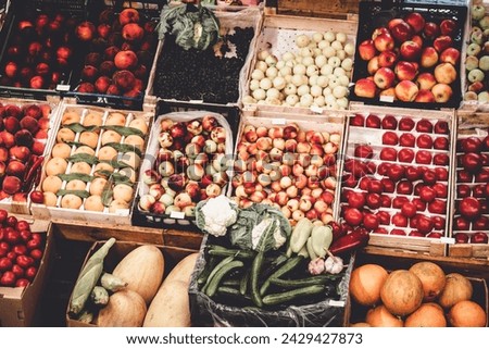 Fruits and vegetables for sale at the market stall. Farmers produce.