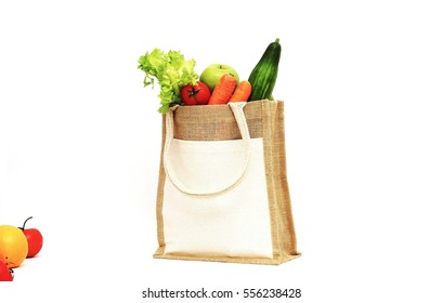 Fruits and vegetables in a shopping bag  - Shutterstock ID 556238428
