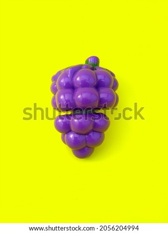 fruit-shaped children's toys. isolated on a yellow background