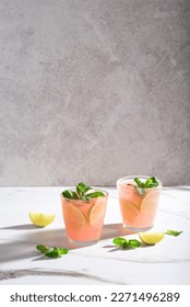 Fruity Moscow Mule cocktail on a marble background, long shadows. Variations of top cocktails. Refreshing summer drinks, close up - Shutterstock ID 2271496289