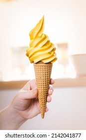 Fruity Orange Ice Cream In Cone