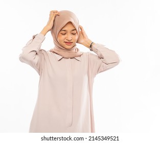 Frustrated Asian Woman In Hijab Holding Head With Headache