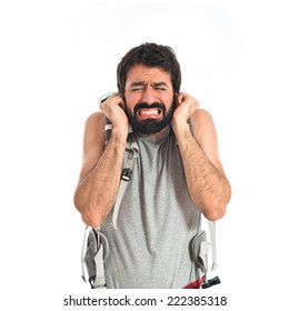frustrated backpacker over isolated white background
