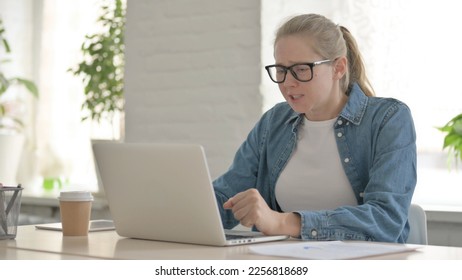 Frustrated Beautiful Woman Working on Laptop, Displeased - Shutterstock ID 2256818689