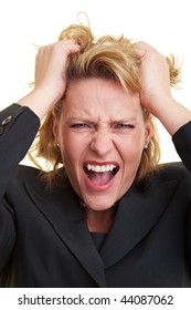 Frustrated Business Woman Pulling Her Hair And Screaming