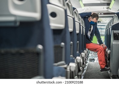 Frustrated Caucasian Transportation Company Owner In His 40s During Pandemic Times Seating Inside One Of His Empty Bus.