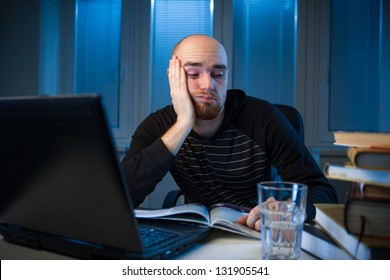 Frustrated College Student Studying Poorly At Late Evening, Night Before Exam, Funny Night Procrastination Concept