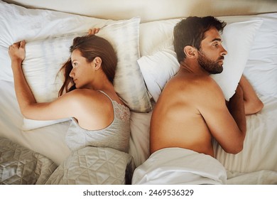 Frustrated couple, bed and argument above with fight, disagreement or erectile dysfunction at home. Top view of man and woman in toxic relationship, breakup or divorce from affair in bedroom at house - Powered by Shutterstock