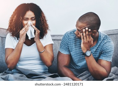 Frustrated couple, sick and argument with fight on sofa in disagreement, conflict or allergies at home. Man or woman blowing nose with tissue for flu, cold or illness in breakup or toxic relationship - Powered by Shutterstock