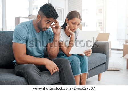 Frustrated couple, sofa and documents with debt for financial crisis, expenses or bills at home. Man and woman in concern, stress or anxiety with paperwork for mortgage, house loan or eviction notice