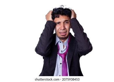 Frustrated And Desperate Businessman Clutching His Hair Because He Lost His Job. Young Adult About To Cry Over Something Bad That Happened To Him, Wearing Glasses On His Head, On White Background.