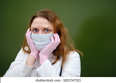 Frustrated Doctor In Medical Mask In School Class, Copy Space. School Education During The Coronavirus Epidemic