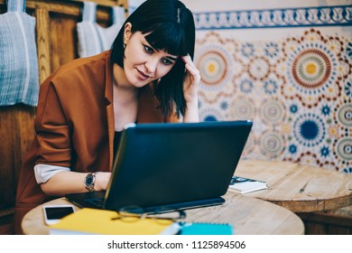 Frustrated Female Programmer Feeling Headache Of Deadline At Coworking Space While Creating Website On Laptop Device, Tired Woman Reading Unhappy Email From Colleague Using Netbook For Communicate