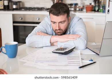 Frustrated man calculating bills and tax  expenses