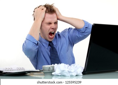 Frustrated Man Pulling His Hair Out