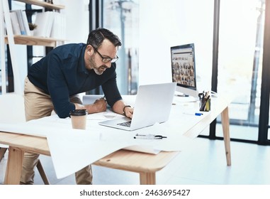 Frustrated, mature man and architect with laptop and blueprints for building planning and design problem. Senior, male engineer and computer with documents for panic or stress at project deadline - Powered by Shutterstock