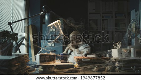 Similar – Boy with sister lighting up with flashlight