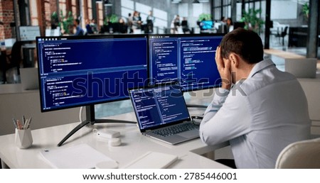 Frustrated Programmer Struggles Alone Late Night Coding Web Software.