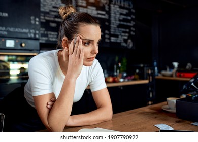 Frustrated Small Business Owner In Closed Cafe   