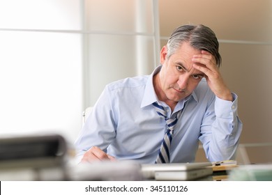 Frustrated Stressed Business Man In An Office