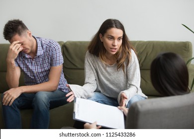 Frustrated Stressed Wife Talks To Psychologist About Bad Relationships Sitting On Couch With Husband, Unhappy Woman Sharing Problems With Counselor, Couple Counseling, Family Marriage Therapy Session