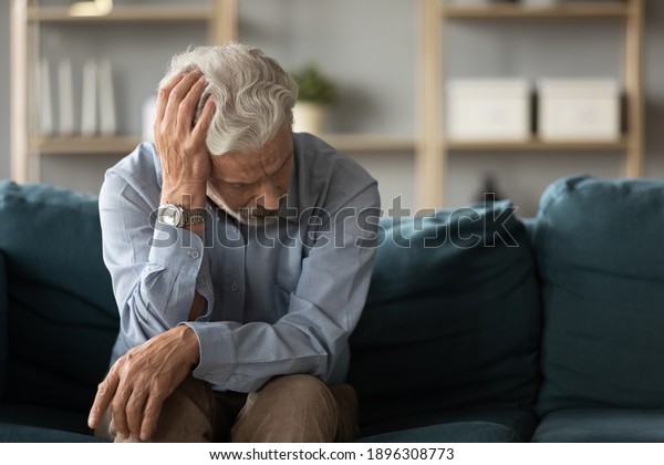 Frustrated Unhappy Middle Aged Mature Man Stock Photo (Edit Now) 1896308773