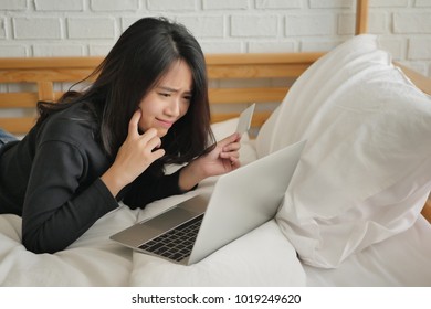 Frustrated Unhappy Woman Using Laptop Computer And Credit Card, Bad Deal Or Scam Online Shopping Concept