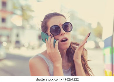 Frustrated Woman Talking On Phone