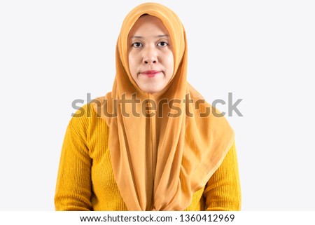 Frustrated young asian woman, face expression of Muslim asian woman wearing hijab isolated over white background