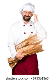 Frustrated Young Baker Holding Some Bread