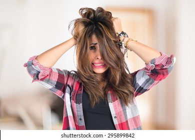 frustrated young girl on unfocused background
