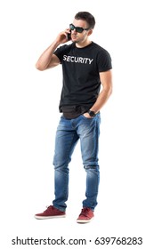 Frustrated Young Undercover Police Officer Talking On The Mobile Phone. Full Body Length Portrait Isolated On White Studio Background. 