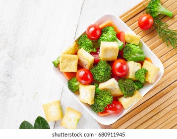 Fry Tofu Salad In A White Bowl. White Background.
